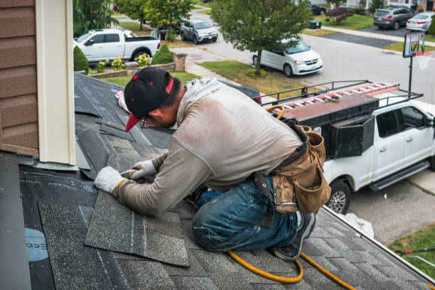 Professional Gutter Installation technician working in Oakland, PA